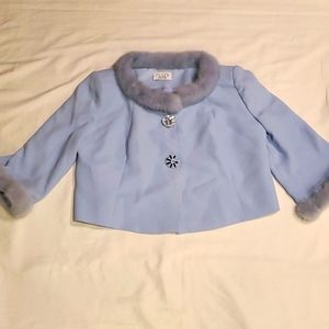 MUSANI COUTURE jacket. Fur collar